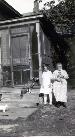 Edith Kiichli and Mrs. Wales at back door of Ingersoll house