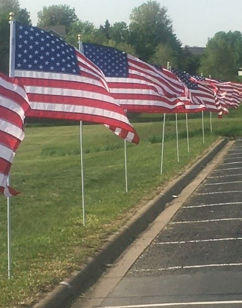 Flags in a parking lot